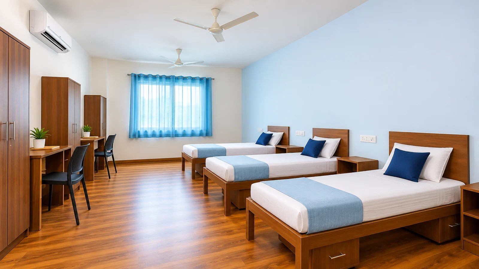 Illustrative shared room with three single beds, individual desks and wardrobes, and AC