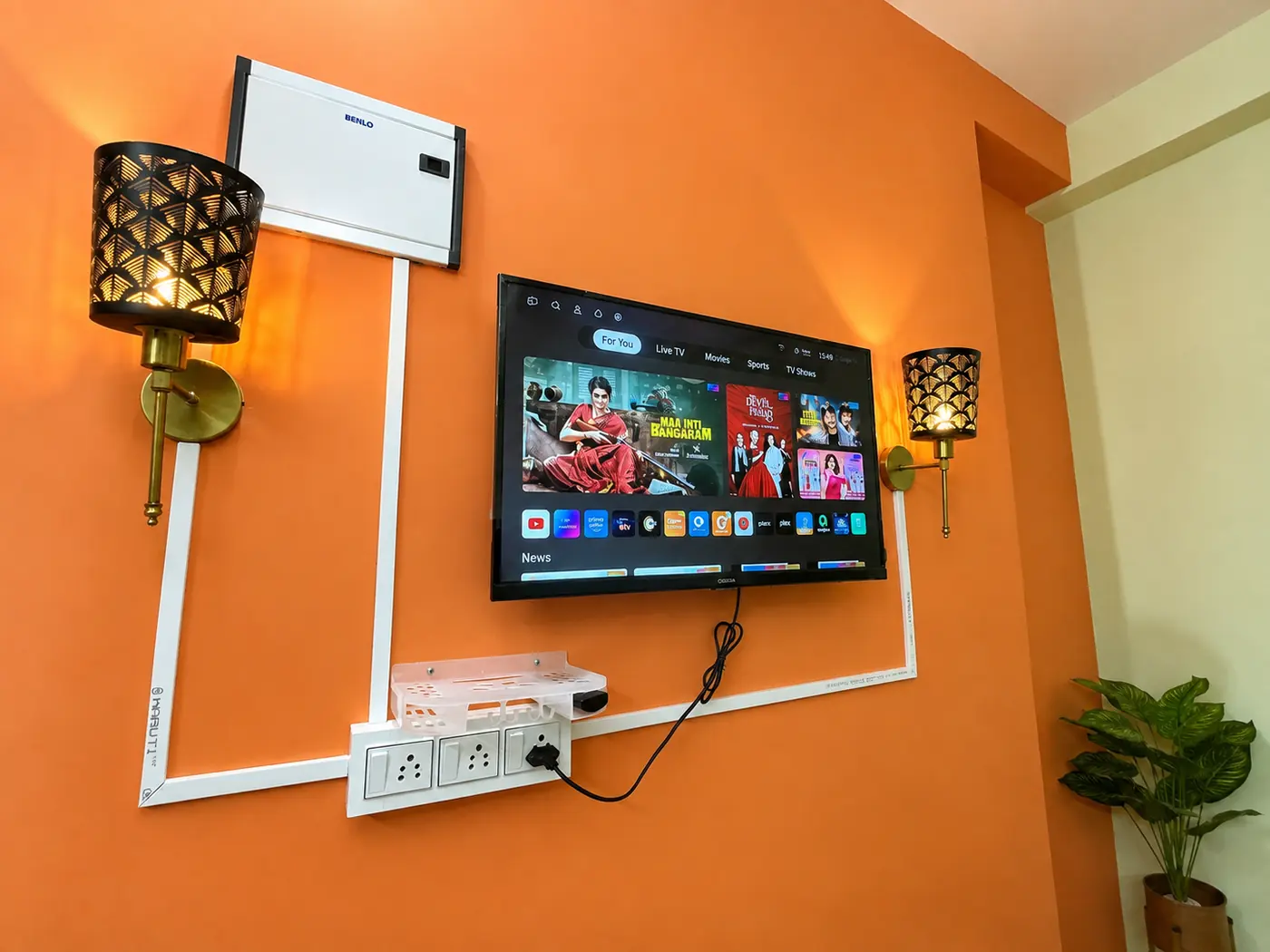 TV wall in the living room at Yostel Mars