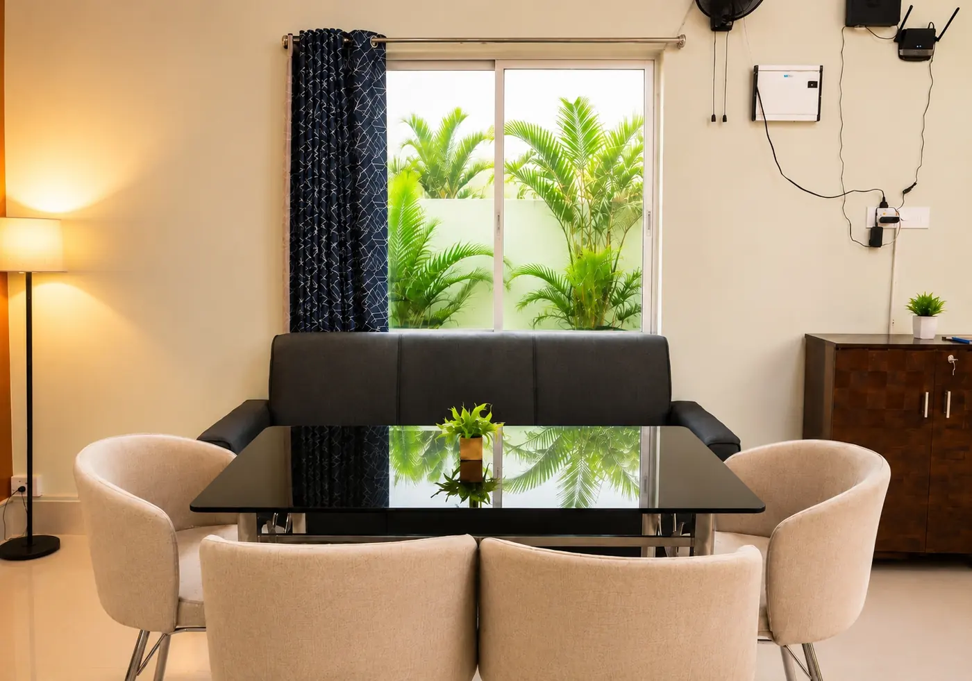 Dining table by the window at Yostel Mercury