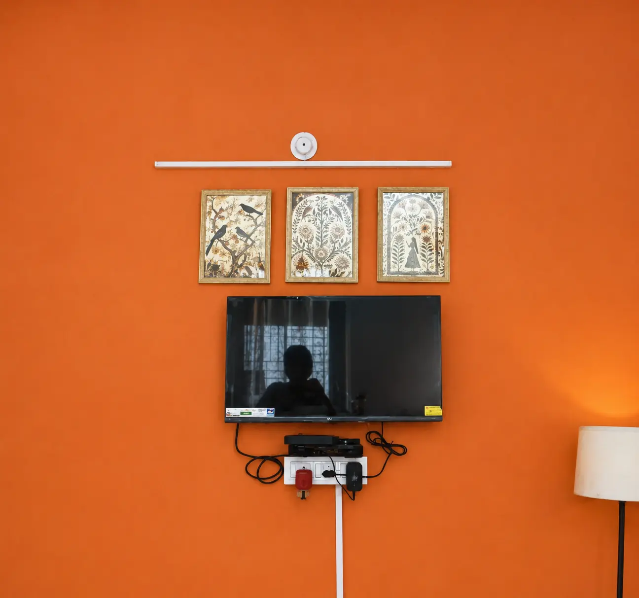 TV wall in the living room at Yostel Mercury