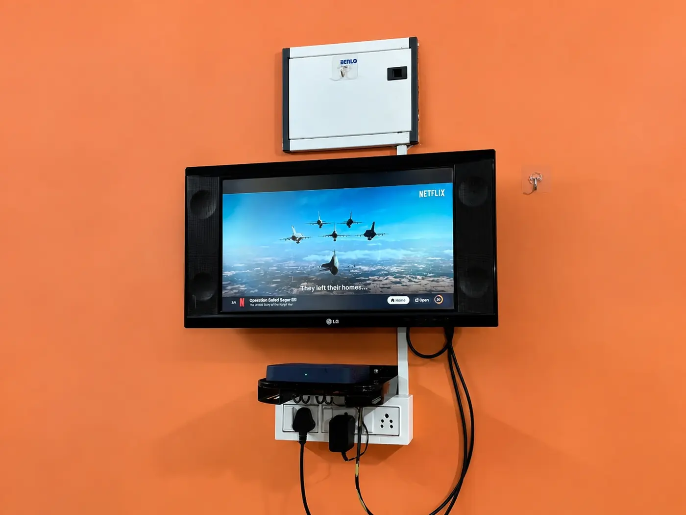 TV wall in the living room at Yostel Venus