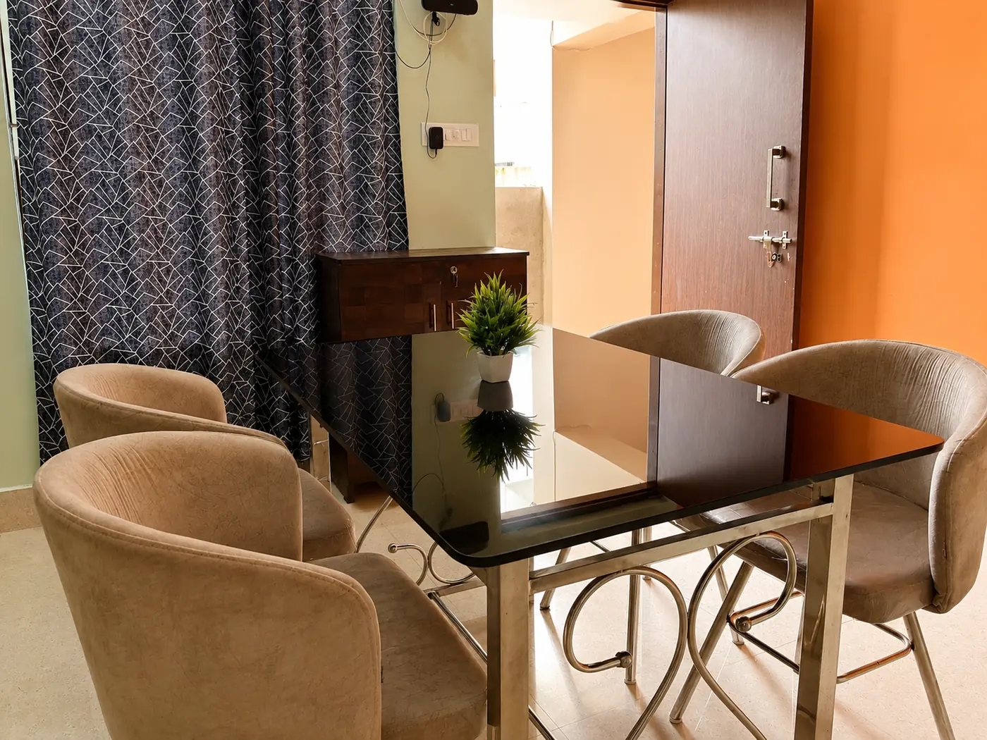 Dining chairs and table at Yostel Venus
