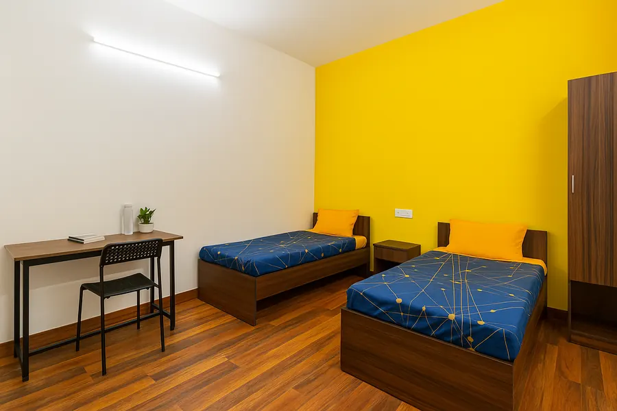 Twin-sharing room with study desk